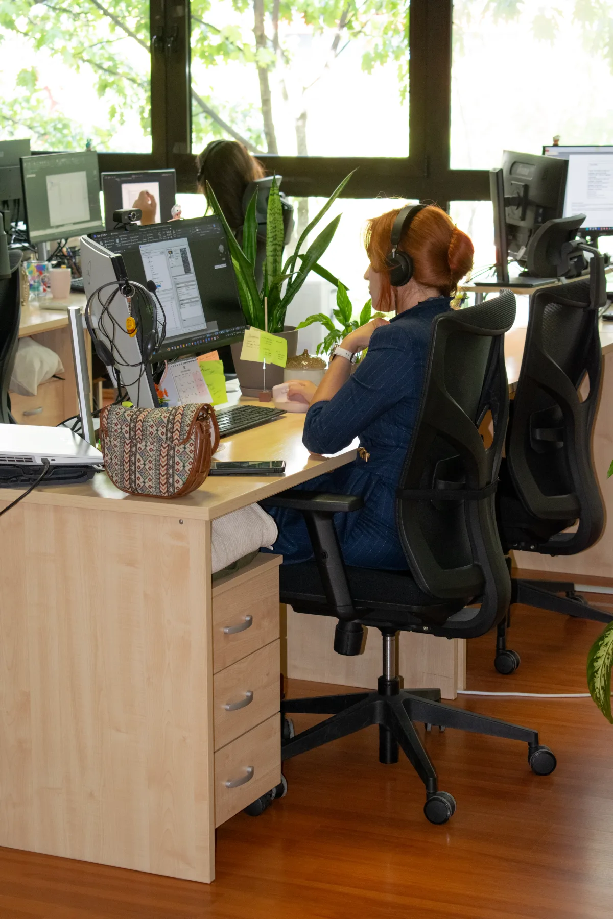Engineer working at a desk in the Quantum Proing office